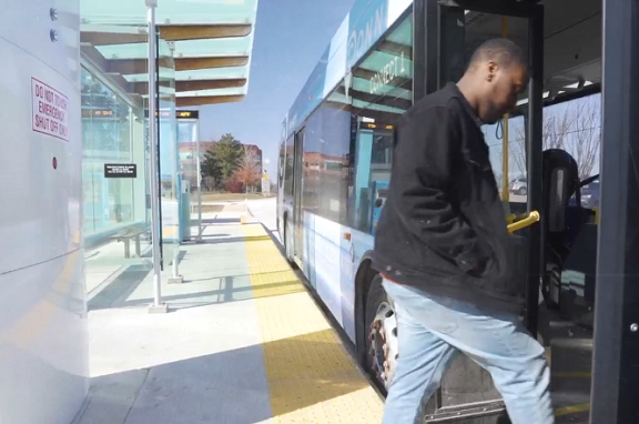 Person boarding a CONNECT bus